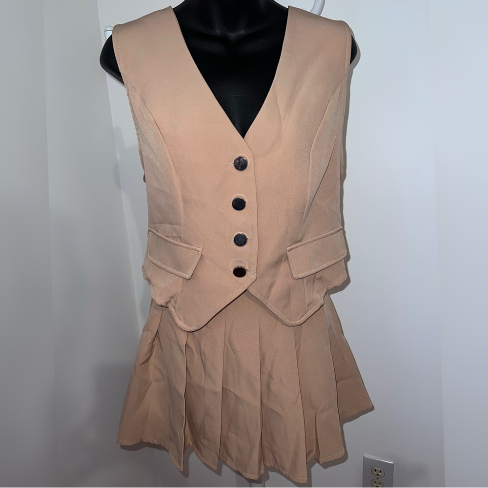 Tan two piece pleated skirt set with vest